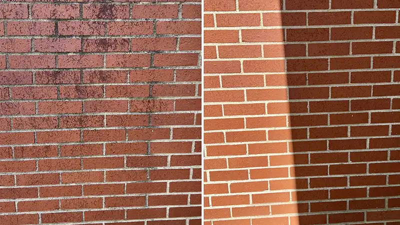 Soft washing does not use the pressure of a traditional pressure washer making it safe for historic brick.